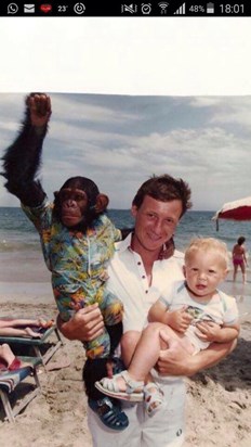 Dad, myself and a monkey! On holiday in Greece.
