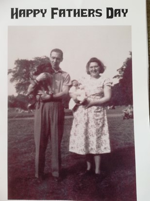 Mum an Dad with Bob the dog and a baby Michael1442061340857094371