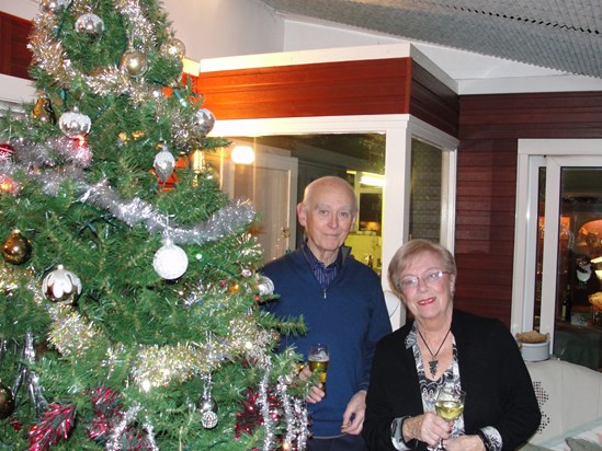 Mum Dad and a Christmas tree