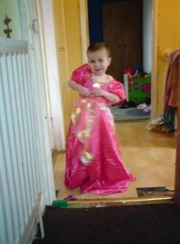 Tyler in his sisters dressing up dress aged 2!