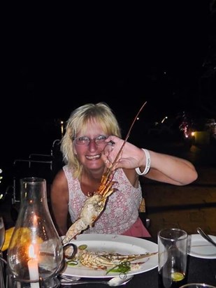 Mum in Sri lanka on her last holiday having her favourite meal by the pool, Lobster, Crab & Prawns