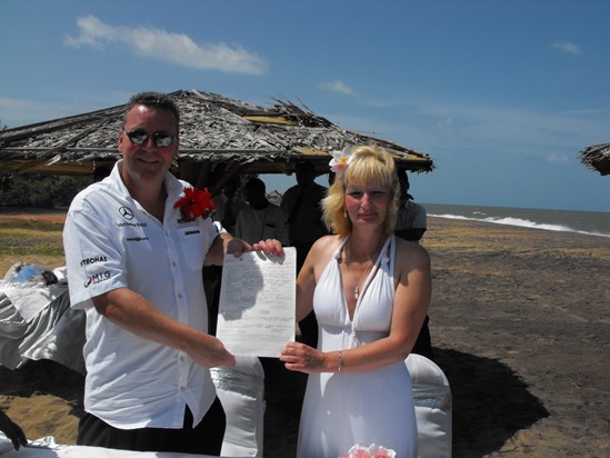 Angie and Simon proudly holding their Sri Lankan Marriage Certificate