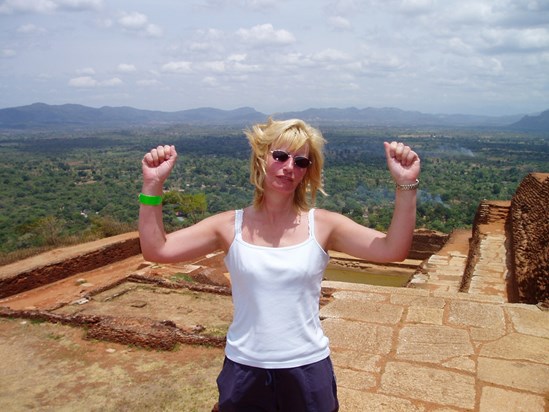 Angie celebrating after climbing Sigiriya, August 2004