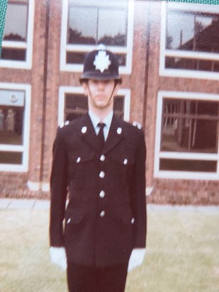 Newly trained Peter at his police passing out parade 