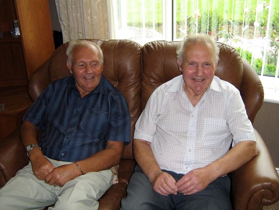 With identical twin Norman in 2012