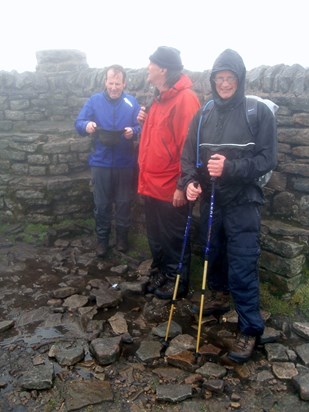 Michael planning the descent from Ingleborough summit. With Richard & Robert. 28 June 2013.