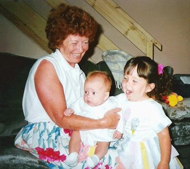 Brenda with Grandkids Adam & Rebecca.