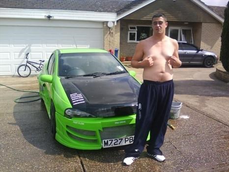With His Green And Black Tigra