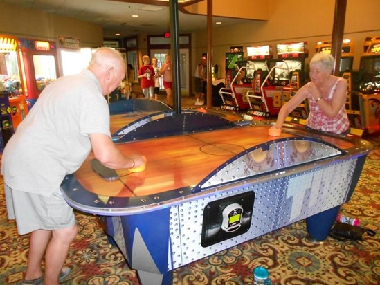 playing air hockey