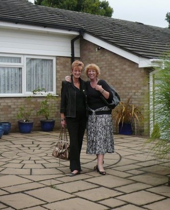 Eve & Myra in the front garden in Great Kingshill 