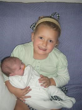 Caitlyn (friends daughter) with Noah only days old