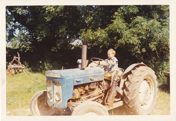 His love of machinery started young!
