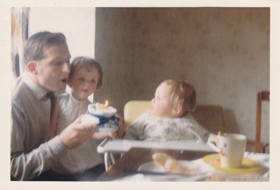 James's 1st Birthday - he was frightened of the candle, so his sister Claire & Dad helped!