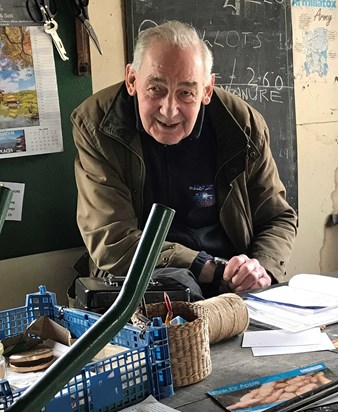 Chairman Jim behind the counter at Highgate Allotments Trading Shed - "What Do We Know?"