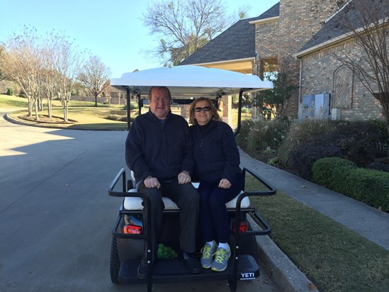 Uncle Stephen - riding the golf cart at Eagle Mountain Lake Resort