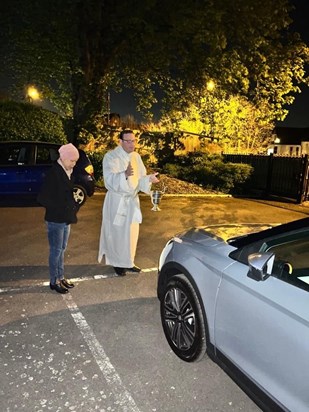 Fr Paolo blessing new car