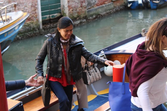 Yolly on a canal boat in Venice