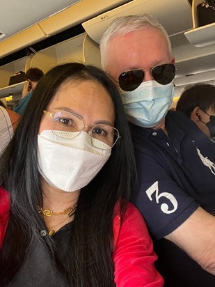 Inthira and Peter on the plane to Bangkok April 2022