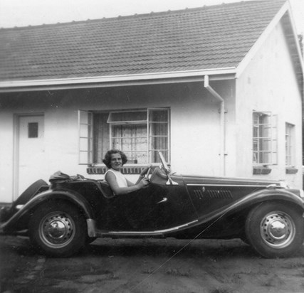 Eileen's MG and bungalow in Rhodesia