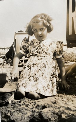 Doreen was always happy by the sea and sand, here on a family excursion 