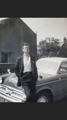 Dad with his first car. 