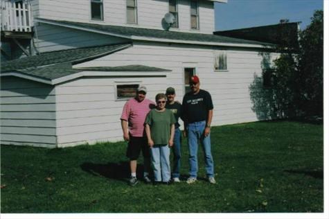 Dan, our Mom, Jeff (behind our Mom) and our step-dad Steve