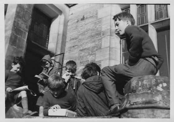 Tony Frew (reading in the background) at Temple Grove prep school, about 1967 or 8