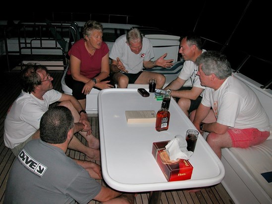 Brian with Jan, Mike, Charlie, Pete and JP setting the world straight after a day’s diving in the Red Sea. 2005