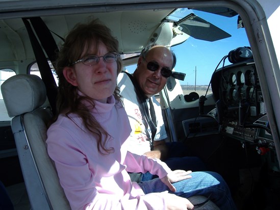 Cherie with David going to soar in the sky