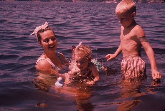 Barb in the water with daughter Rina and stepson Ken