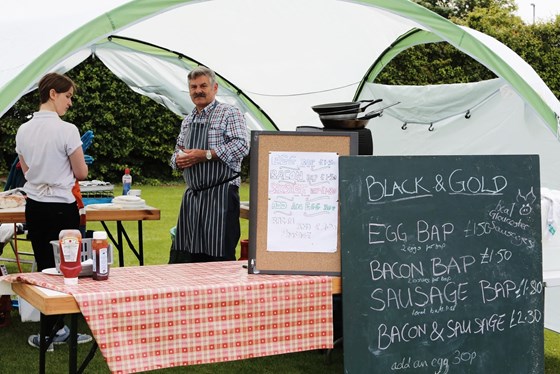 Mike manning the Bacon Butty Stand at Black & Gold Archers