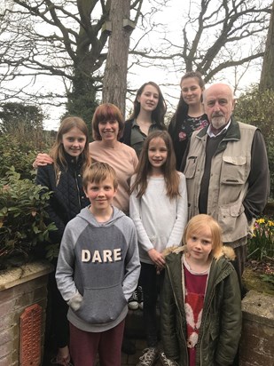 With his six grandchildren