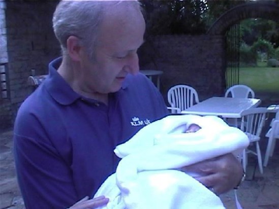 Grandpa with his first grandchild, Issy