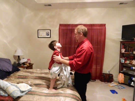 Blade & Dad jumping on the bed :)