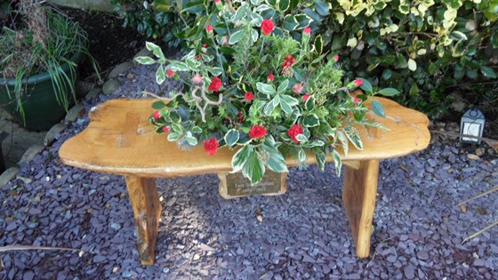 Your bench in the garden with a lovely Xmas floral arrangement