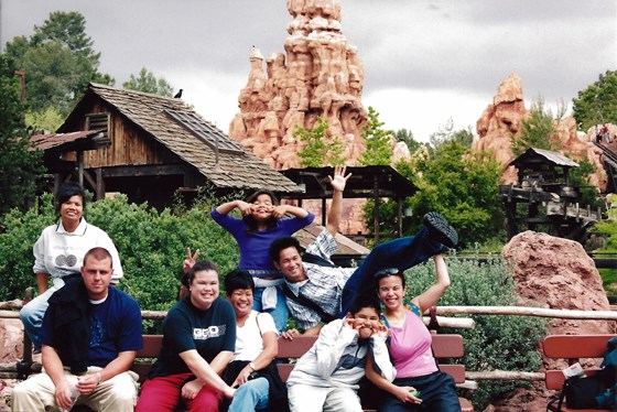 Auntie Baby cheesing in a silly pic at Disneyland 2002
