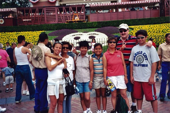 Auntie Baby with Grandma Arellano, Donna, Rachel, Emily, Dan, and Aaron at Disneyland, 2003