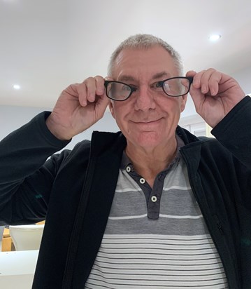 Dad trying to convince us his glasses are just fine