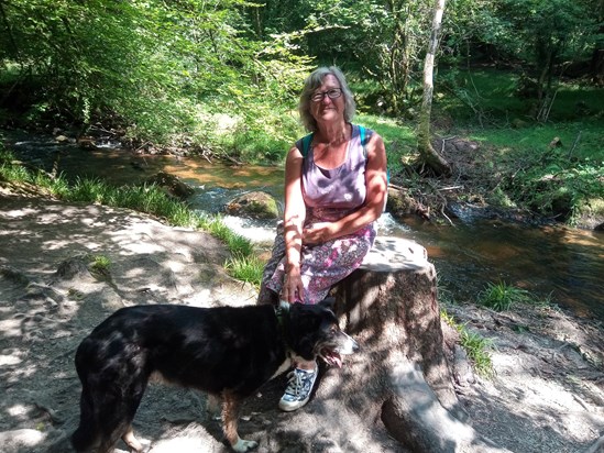 Angie with Rocky, the last time he played in a stream, I have kept the stick he played with.