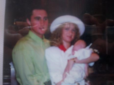 mommy ,daddy and Jakey at his christening