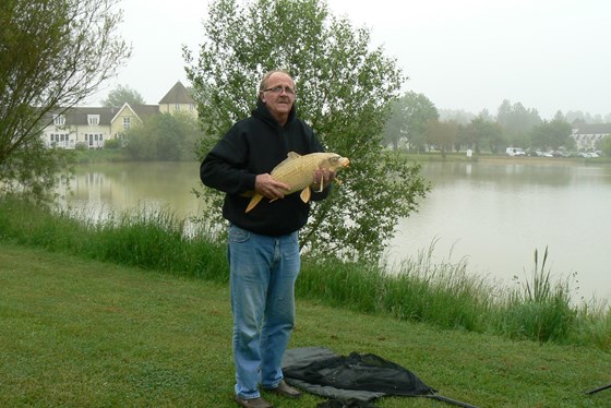 Chris with the Ghost Carp he caught.