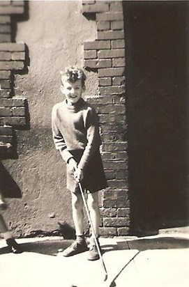 John aged 11 with his first golf club.