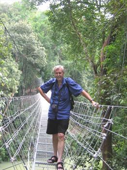 Bob's a swinger on this cable bridge in Malaysia.