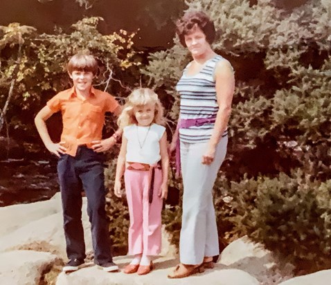 Mum, Deb and Peter posing on a rock