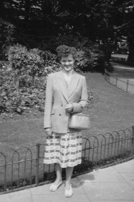 Mum posing with her new handbag 