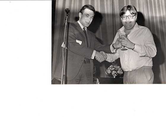 Ian being presented with supporter of the year trophy by Derby County chairman Ian Maxwell ( mid 1980s)