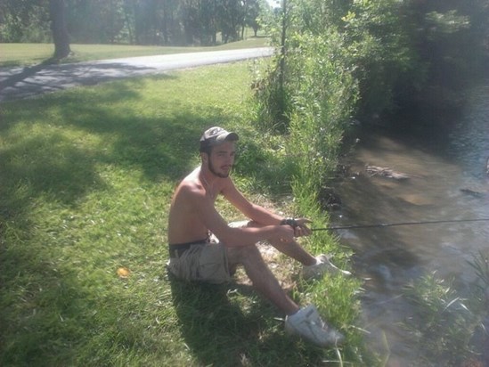 Michael doing 1 of his fave things- Fishing! I tried to out fish him that day :)