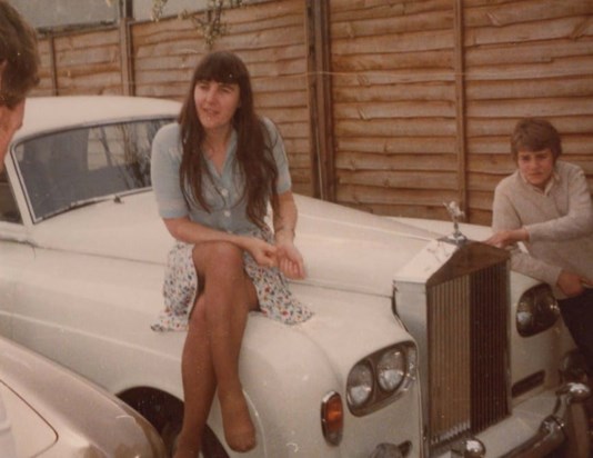 Mum on bonnet of Roller with a young Tony looking on...... lovely photo of mum.