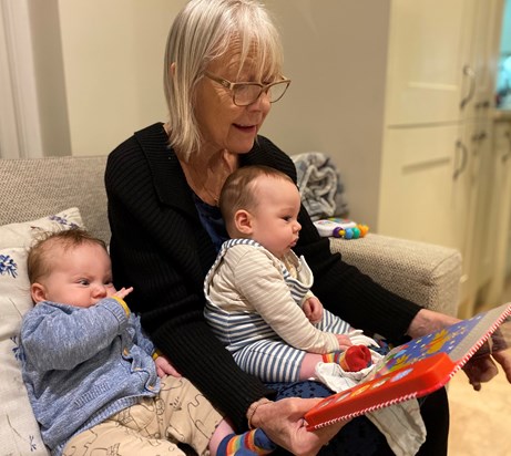 Maggie reading a Christmas book to Lennox and Miles, November 2021