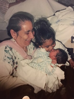 Grandmum holding Gurvi when he was born